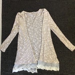 Cardigan sweater with Lacey detail on bottom hem